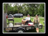 Mitch and jan harda at work with the grill